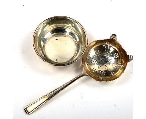 An Elizabeth II silver tea strainer and stand, by Cooper Brothers & Sons Ltd, hallmarks Sheffield 1965, strainer length 14cm,