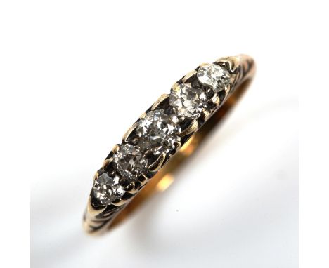 A graduated five stone diamond half hoop ring, unmarked gold settings with old-cut diamonds, setting height 3.7mm, size I, 1.