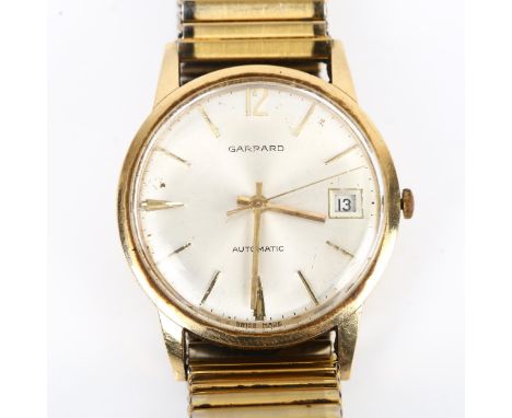 GARRARD - a Vintage 9ct gold automatic bracelet watch, silvered dial with gilt baton hour markers, sweep centre seconds hand 