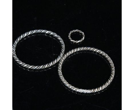 3 similar pieces of Danish stylised sterling silver jewellery, comprising 2 slave bangles and 1 ring, makers including Bent L