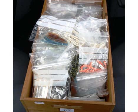 A large quantity of loose gemstones, jewellery findings etc, including pearls, beads, agate, quartz etc (boxful)Lot sold as s