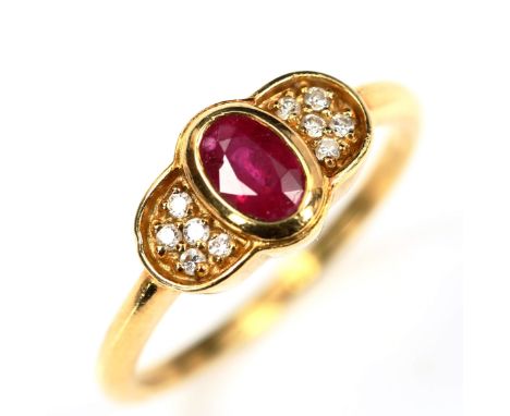 A modern 18ct gold ruby and diamond dress ring, set with oval mixed-cut ruby and round-cut diamonds, setting height 8.2mm, si