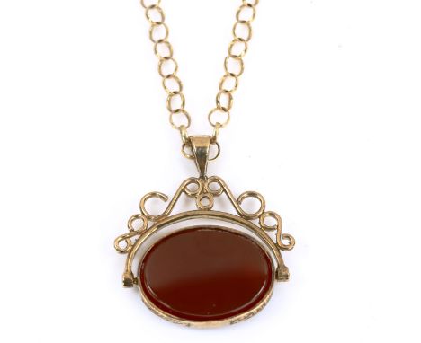 A late 20th century 9ct gold hardstone swivel fob necklace, set with onyx and carnelian, on 9ct belcher link chain, hardstone