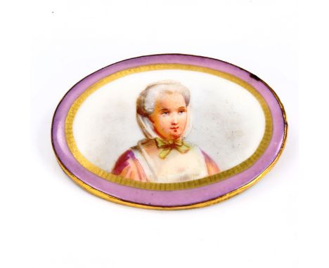 A large Victorian oval watercolour on porcelain brooch, depicting female portrait, in unmarked yellow metal frame, length 65.