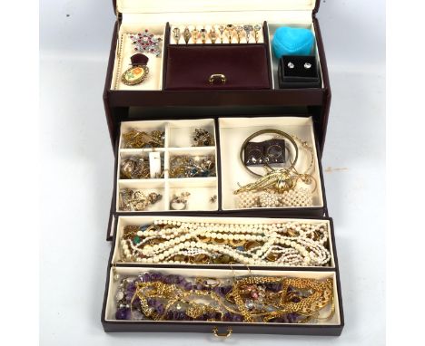Various costume jewellery, in leather jewellery boxLot sold as seen unless specific item(s) requested 