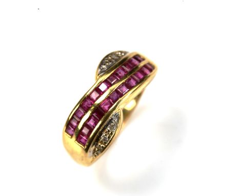A Continental 18ct gold ruby and diamond crossover ring, unmarked high carat gold settings, with calibre-cut rubies and singl