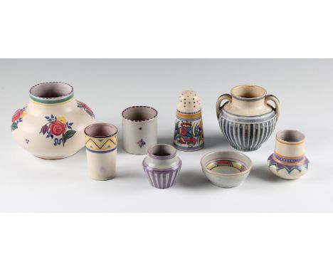 A group of eight Poole pottery items to include six vases having floral and geometric design, bowl and sugar shaker.