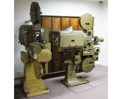 Two Guamont Kalee Universal Model 21 cinema projectors, serial No. 211255 and 211263. The reel and focal lens units having pl