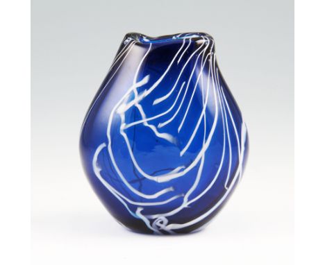 A Whitefriars experimental flattened form glass vase with blue coloured body with white ceramic internal decoration, c.1971, 