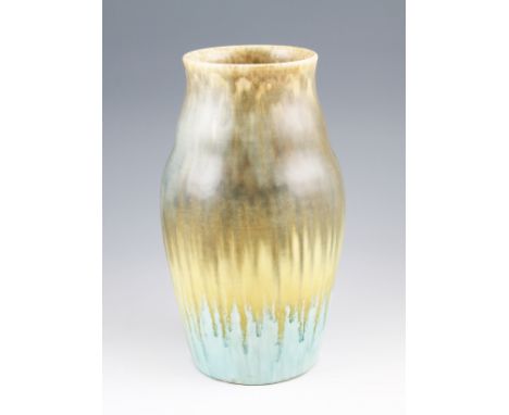 A Ruskin pottery vase of waisted form having a graduated coloured design comprising of matt and gloss glazes including turquo