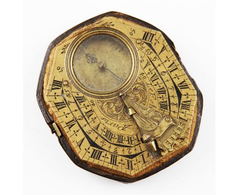 An 18th Century French brass Butterfield type pocket sun dial with compass, the elongated octagonal body having three hour sc