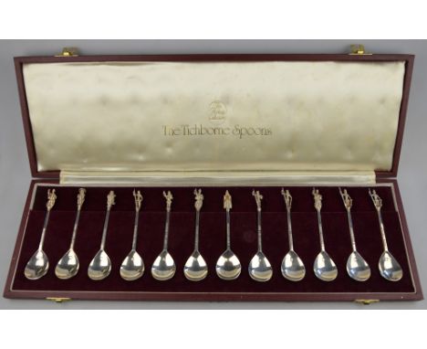 The Tichborne Spoons - a cased set of twelve silver spoons with gilt figural finials, maker B M, London 1978