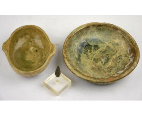 Chinese Han Dynasty 206 BC - 220 AD - a small pottery circular dish covered with an iridescent glaze, 11.8 cm dia. and a tria