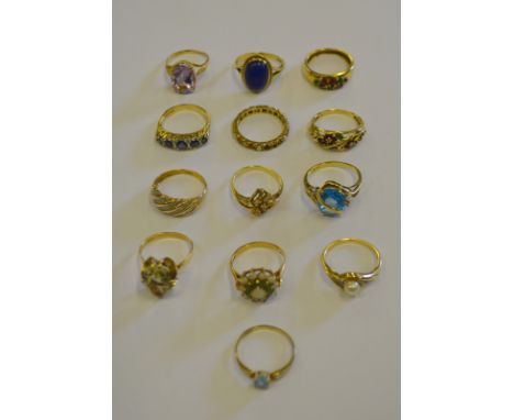 A collection of thirteen various stone set rings including lapis lazuli, opal, garnet and pearl, topaz, amethyst etc, all hal