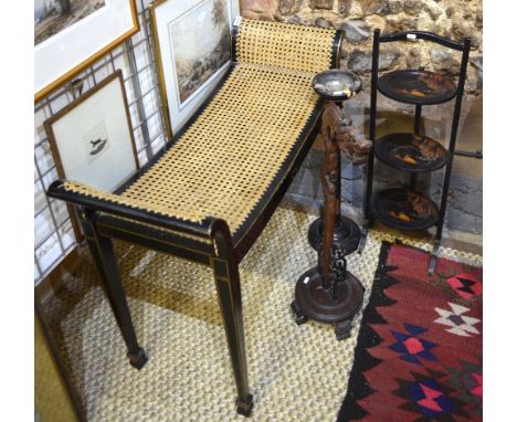 A chinoiserie cane seat duet stool/window seat to/w a lacquered three tier cake stand, a smoking stand and a dragon carved ha