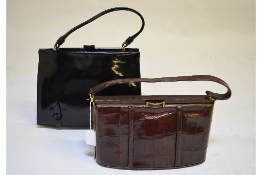 black patent crocodile handbag
