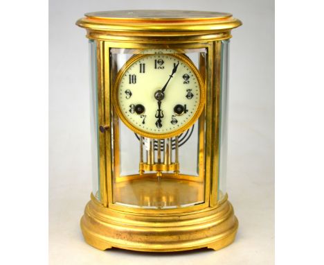 A French oval four-glass mantle clock with enamel dial, drum movement and mercury-compensated pendulum, 23 cm