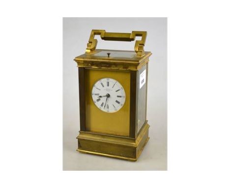 A late 19th century lacquered brass repeating carriage clock, the 8-day two train pillared movement striking the hours and ha