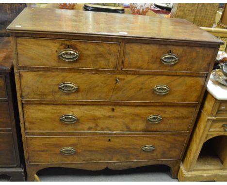A George III mahogany chest of two short over three long graduated cockbeaded drawers, over a shaped apron to splayed bracket