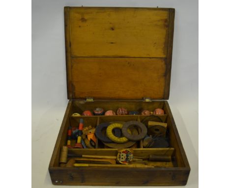 An indoor games compendium, including carpet bowls and croquet, quoits, etc., in plain pine box