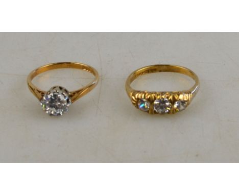 A single stone cubic zirconia ring, 9 ct set to/w three stone cubic zirconia ring, 9ct set (2)