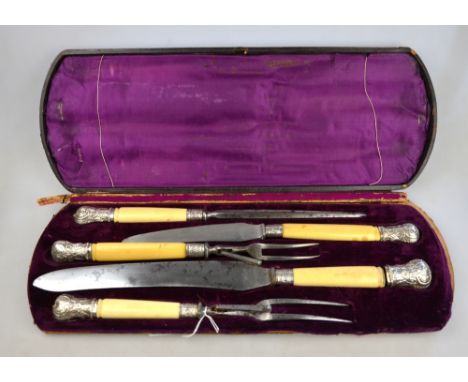 A Victorian cased five-piece carving set with silver-mounted ivory handles, Sheffield 1879 Condition Report Finial loose on m