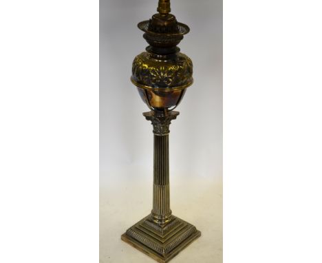 A table lamp (converted from an oil lamp) on neo-classical electroplated reeded column and stepped square base