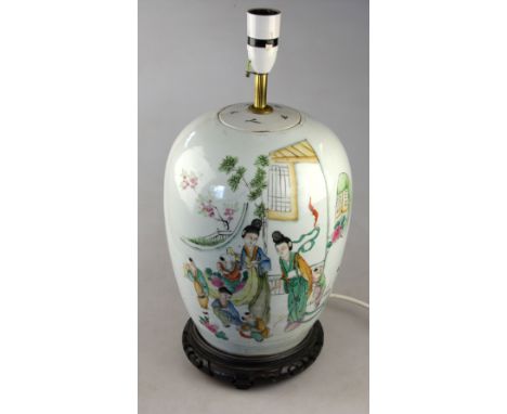 A Chinese early 20th century ovoid famille rose vase and cover decorated with maidens and boys in an interior and calligraphy