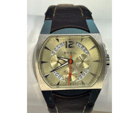 BREIL: gents steel cased dress watch, leather strap with deployment clasp, requires battery, leather strap is separating. UK 