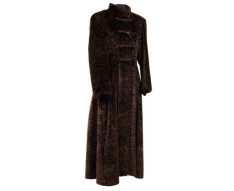 A Nina Ricci long dark brown faux astrakhan coat with frogging fastenings to the front, size 10 CONDITION REPORT: Good vintag