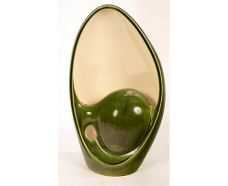 A Holkham green pottery lamp of modernist design, 38cm high CONDITION REPORT: Condition information is not usually provided i