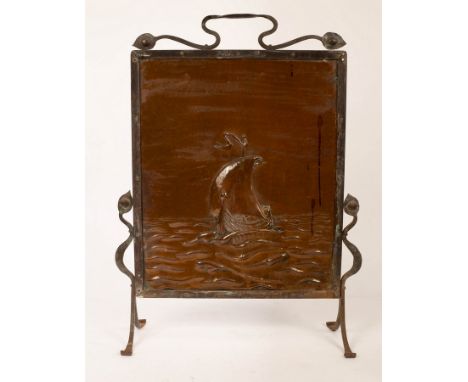 An Arts & Crafts copper firescreen, the panel repousse decorated with a stylised sailing boat within a wrought iron frame, 74