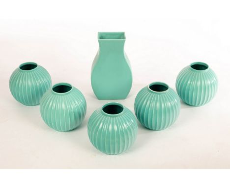 Poole Pottery, five ribbed turquoise globe vases, 15cm high and a tall turquoise vase, 24cm high (6) CONDITION REPORT: Condit