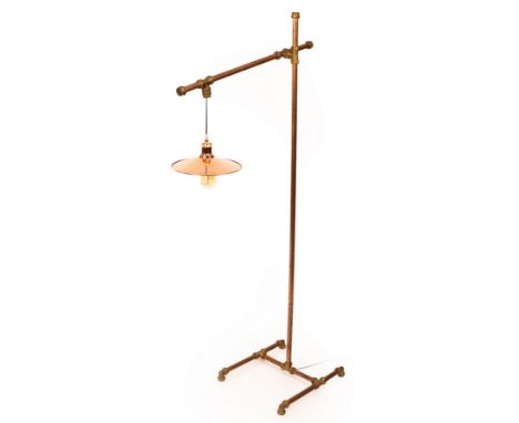 A copper standard floor lamp with adjustable arm, 160cm high CONDITION REPORT: Wired for use and has been PAT tested. Dimmer 