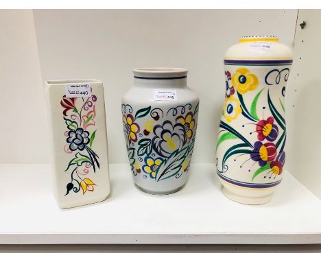 Poole Pottery, a floral peanut shape vase, 28cm high and two other floral vases, all with printed marks CONDITION REPORT: Con