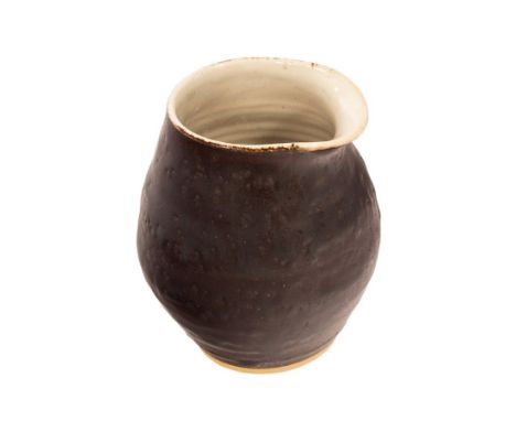 Lucie Rie (Austrian/British, 1902-1995), small stoneware pouring vessel, circa 1958, manganese glaze with white glaze to the 