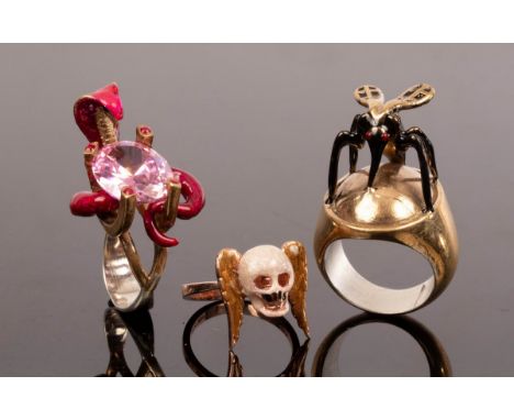 Three modern silver and enamel rings, including one modelled with a pink cobra coiled around an oval facetted pink stone, pos