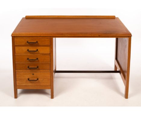 Lebetkin Products Ltd, a light oak desk, 1950s, fitted four shallow drawers above a deep drawer, stamped to underside with ma