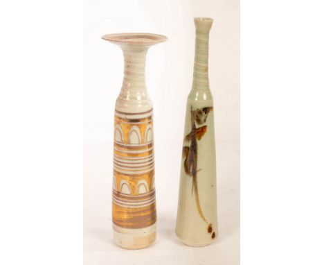 Mary Rich (born 1940), a slender vase with spirally moulded neck, gold arch designs to body, impressed mark, 20cm high and a 