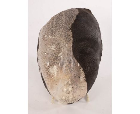 Lucy Rockliffe, a raku fired wall mask, impressed mark, 20cm high and two ceramic wall plaques, seahorse, 29cm high and bird,
