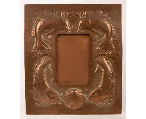 An Arts & Crafts copper frame of easel form, embossed fish and shells, 35cm x 26cm CONDITION REPORT: Patches of discolouratio