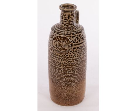 John Maltby (1936-2020), a stoneware flagon of dimpled form with oval plaque inscribed WINE, Stoneshill Pottery mark, 21.5cm 