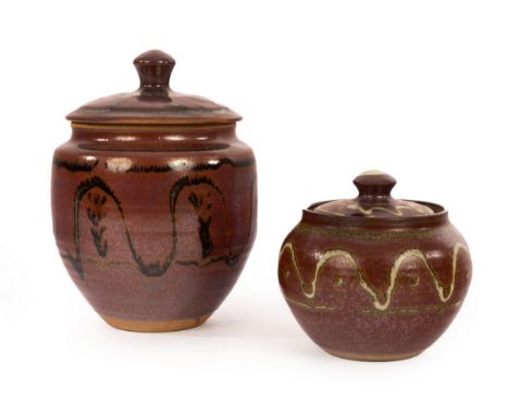Winchcombe Pottery; two lidded jars with trailed decoration, 19cm and 12cm high/Note: unsigned, but purchased from the potter