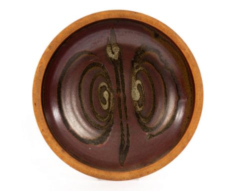 Ray Finch (1914-2012) for Winchcombe Pottery, a large stoneware bowl, concentric patterns on iron glaze, 33cm wide/Note: unma