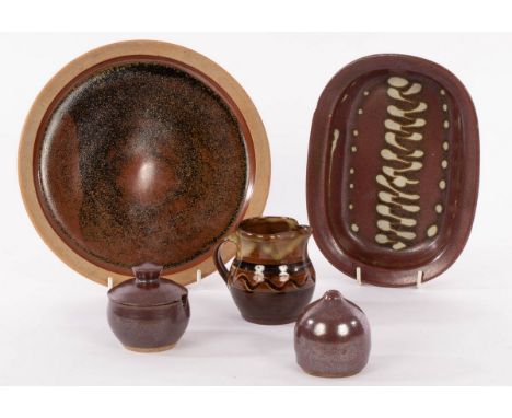 Winchcombe Pottery, a small group of pottery comprising small slip decorated jug by Patrick Groom, 8.5cm high, oval bowl, sal