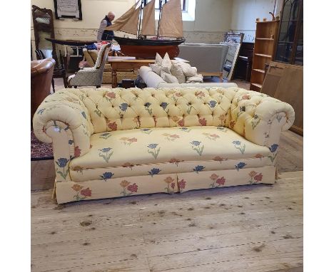 A Chesterfield sofa, 210 cm widePossible iron frame74 cm high, 96 cm deep, feet should be able to be taken off, no doubt scre