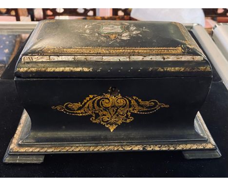 A Victorian papier mache tea caddy, with mother of pearl and gilt decoration, 25 cm wide 