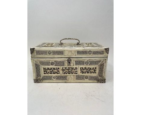 A late 19th century Chinese ivory mounted tea caddy, carved and pierced flowers and foliage, with silver coloured metal mount