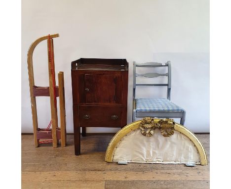 A 19th century mahogany tray top commode, 50 cm wide, a painted single chair, a gilt gesso wall mount and a sledge (4) 
