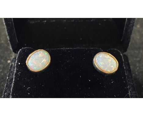 A pair of 9ct gold and opal stud earringsModern 